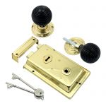 Polished Brass Reversible Rim lock complete with Ebony Reeded Rim knobs (BH1024PB)